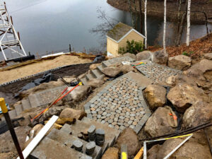 View of shoreline paver path during construction